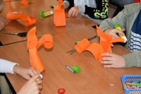 Dzieci biorące udział w lekcji bibliotecznej.