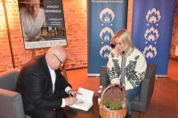 Uczestnicy spotkania z Maciejem Siembiedą