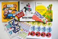 Gadżety promocyjne z akcji ,,Mała książka - wielki człowiek" (książki, naklejki, zakładki)