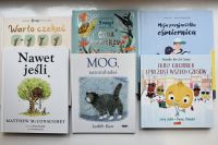 Okładki nowości książkowych na parapecie.
