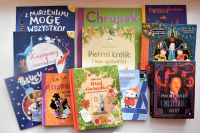 Okładki nowości książkowych na parapecie.