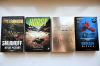 Okładki książek na parapecie